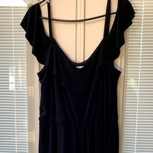 Cupio brand black jumpsuit. Midi length, cold shoulder, ruffle, pockets. XL.